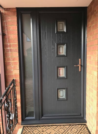 anthracite grey composite front door with side panel and decorative glass