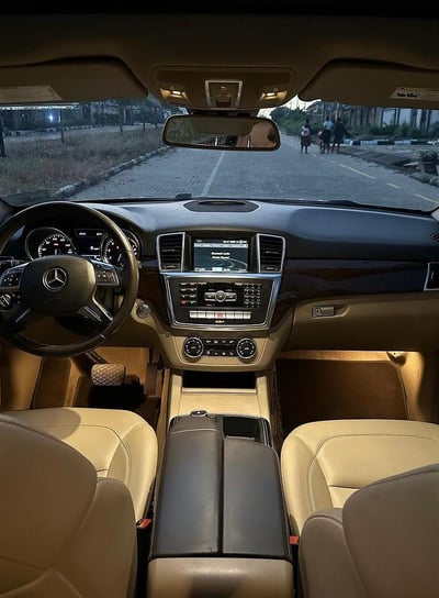 a car dashboard with a dashboard and a steering wheel