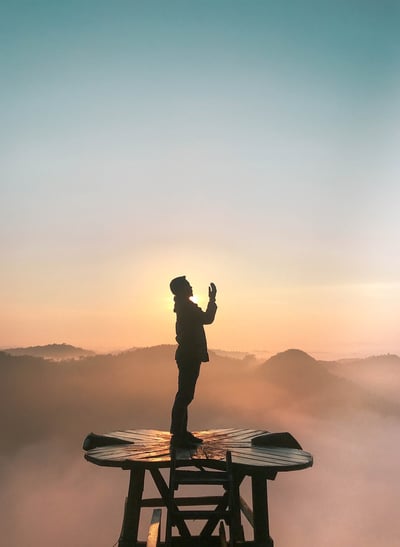 Praying at sunrise.