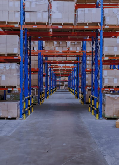 warehouse pallet racking with bridge bays storing boxes