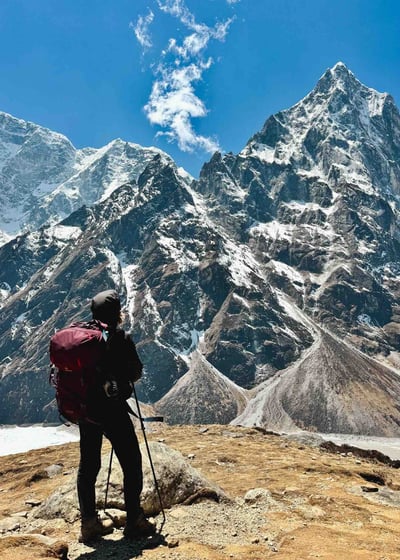 Manon looking at the Taboche peak, Nepal.