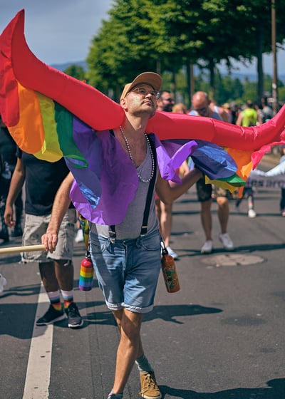 Geneva gay pride, man with wings, rainbow pride wing