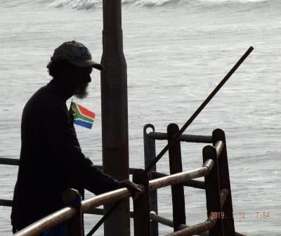 Fisherman with flag 