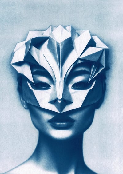 Close-up of a woman with blue-toned skin, wearing an intricate geometric paper mask covering her upp