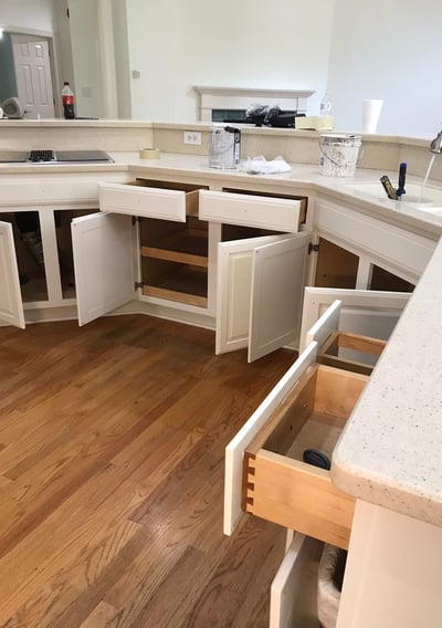 a kitchen with a sink and a counter top