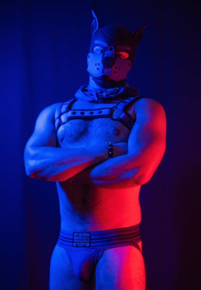 A man in a pup mask.