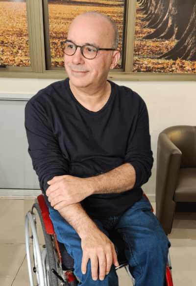 Photo of the psychologist, astrologer, and TCM professor, Ray Pereira, wheelchair user
