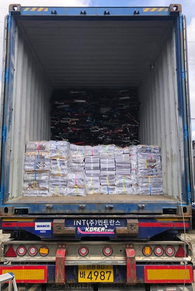 Container of used goods including bicycles and newspapers exported to Afghanistan from Korea