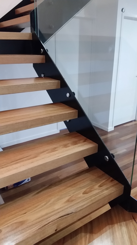 Timber treads on steel stringer