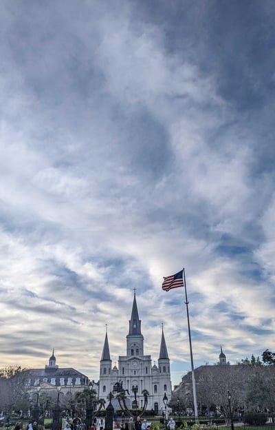 st-louis-cathedral-new-orleans-sky-us-flag