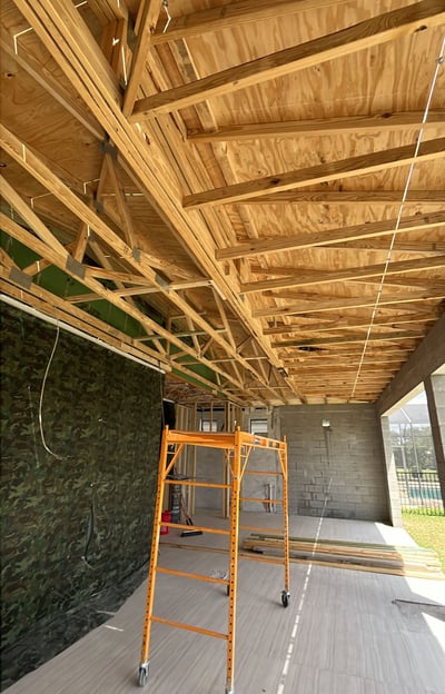 Porch rebuild by FC Innovations with new support columns, wood joists, and foundation work in Florid