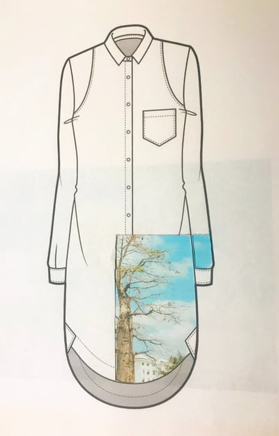 a shirted shirt with a picture of a tree in the background