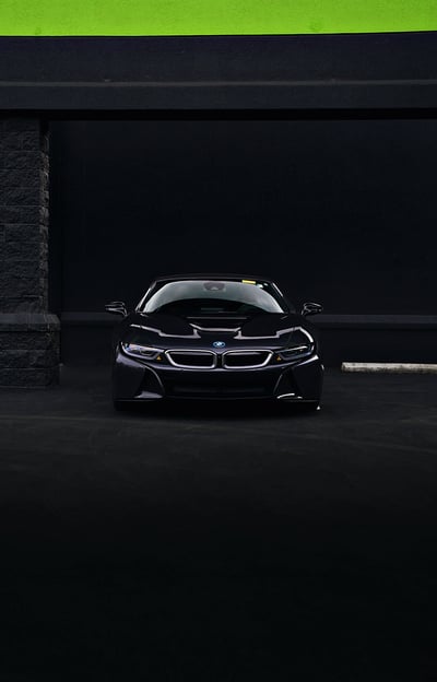 Sleek, black, and elegant BMW Coupe car photos taken at 704 Exotics in Charlotte, North Carolina.