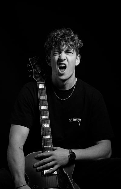 a man with a guitar and a guitar
