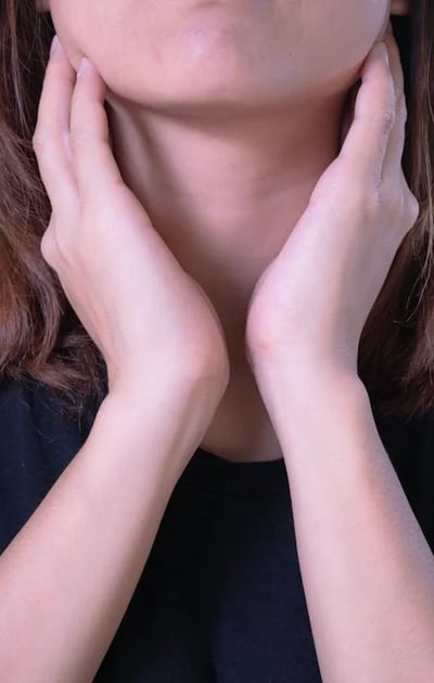 a woman with a toothbrush and a toothbrush in her hand