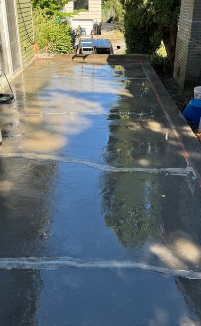 After wet blasting it is ready to be resurfaced and sealed.