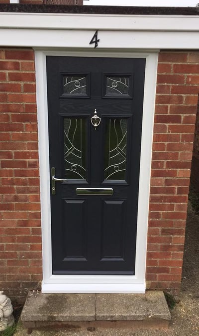 black composite door with chrome hardware and patterned glass fitted in hythe by buildmydoor