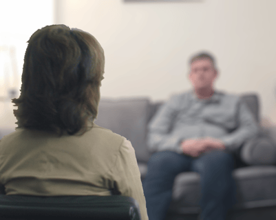 a woman sitting on a couch