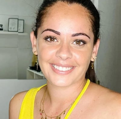a woman with a yellow top and a yellow top