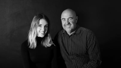 Martin Osner and Samantha Lee Osner, fine art photographers and educators, in black and white portrait.