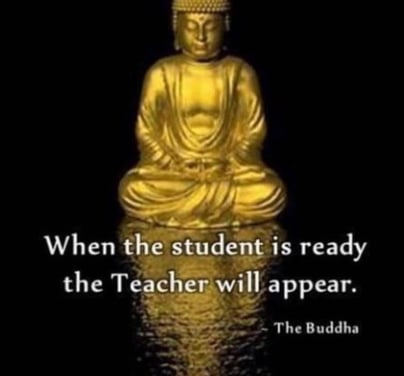 a buddha statue with a quote from the author