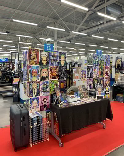 Stand marchés de noël decathlon metz 2022, stand petite plume illustrations manga