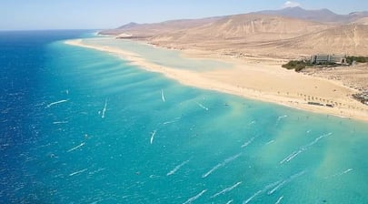 beach dakhla morocco with a view of a beach and mountains