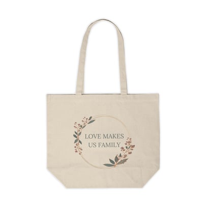 a tote bag with a wreath of leaves and a wreath of leaves