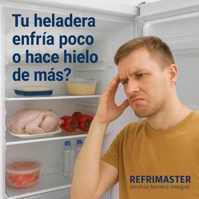 a man in a yellow shirt is holding his head in his hands