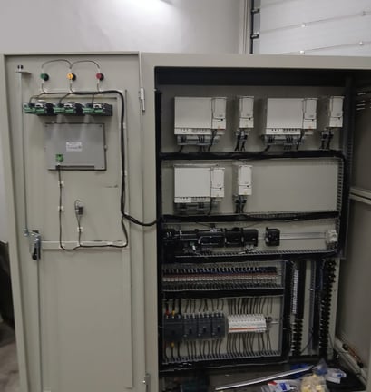 a large electrical cabinet with a lot of wires and wires