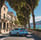 a blue car driving down a street with trees and buildings