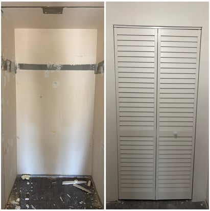 a closet with a closet door and a closet door