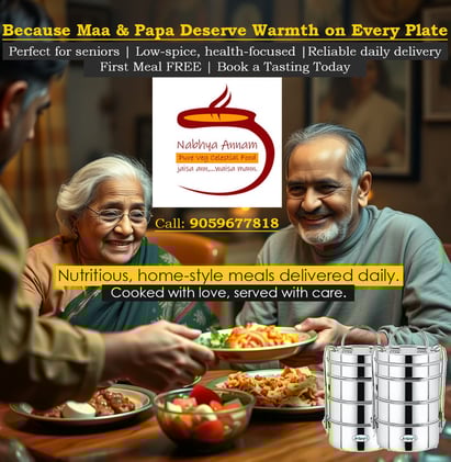 A seniour couple having a meal served by Nabhya Annam.