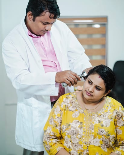 Examining Hearing loss, Ear Infection