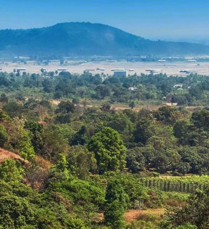 a view of a mountain range with a view of a city