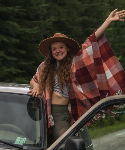 Solana Crowe waving out the window