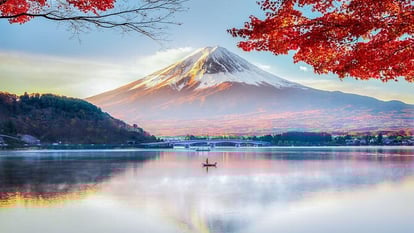 Lake with automn red leaves and Mount Fuji with bark