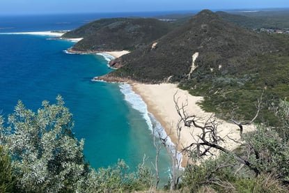 a view of a beach with a view of the ocean