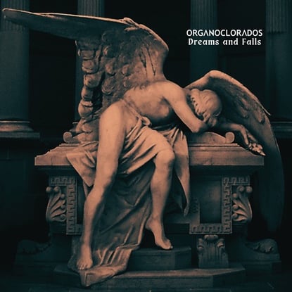 a statue of a angel with wings on a bench