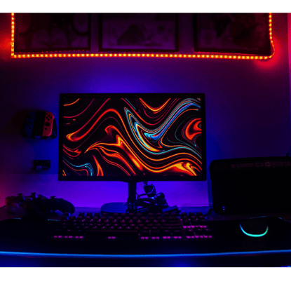 a gaming computer setup with a gaming computer keyboard and mouse