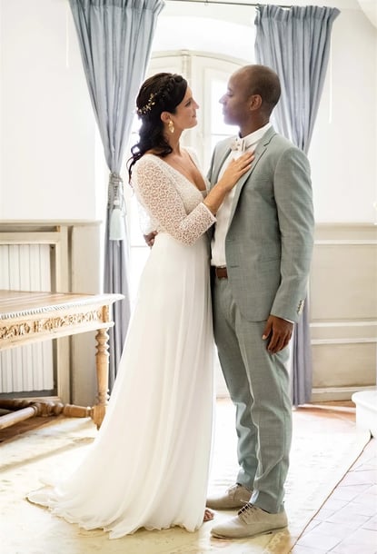 Editorial fine art portrait of bride and groom in a stunning château in the South of France