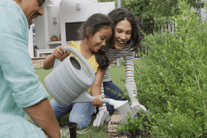 Happy Family Gardening Together