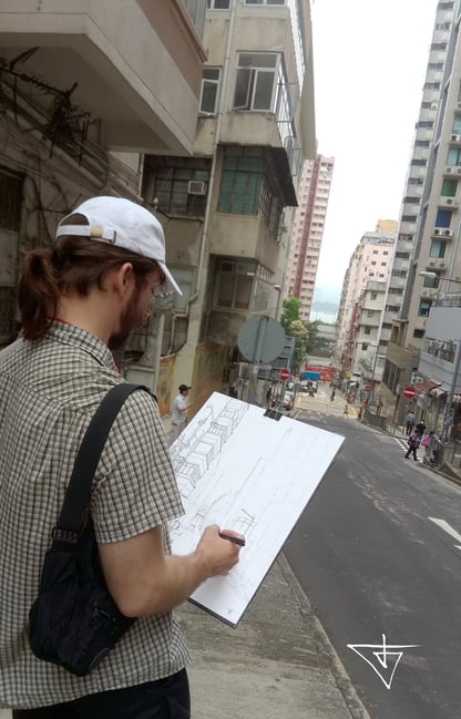 artist Evgeny Bondarenko sketching Hong Kong street