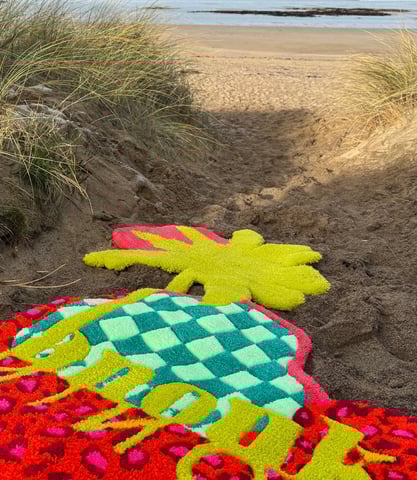 Photo d'un tapis personnalisé pour la marque et Ninon