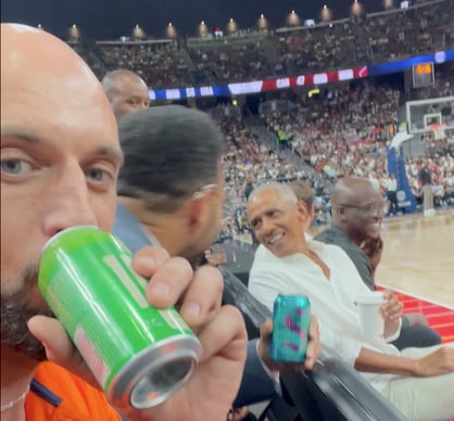 Ray Jarosz courtside with Barack Obama at the Team USA basketball showcase game in Las Vegas, Nevada