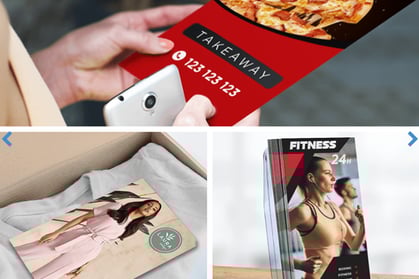 a woman holding a pizza box with a pizza box