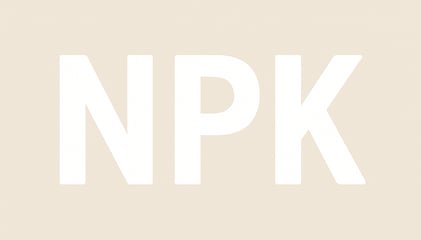 Image of bold white letters 'NPK' on a neutral background, representing nutrients in fertilizer.