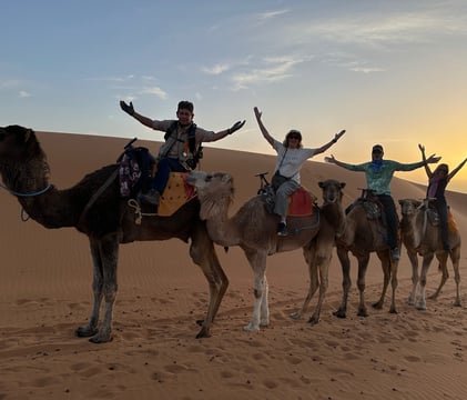 Morocco tours sahara desert camel ride tours at sunset in the desert