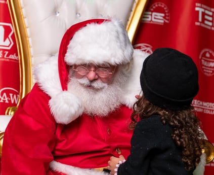 The Santa Cowboy listens to a childs special needs