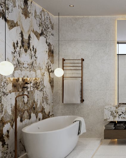 Modern bathroom with a white freestanding tub, a towel warmer and marble accents.
